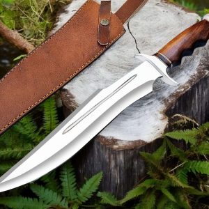 About this item Knife Dimensions: Survival Knife Overall Length 17 Inches; (43.18 Cm) Blade Length 11 Inches (27.94 Cm) Handle Length 6 Inches. (15.24 Cm). Comfortable Grip: Handmade Hunting Knife With Steel And Leather Handle. A Strong And Comfortable Grip With Brass Safety Guard Gives The Knife Rugged Style And Equilibrium For A Bushcraft Knife. Razor Sharp Blade - Camping Knife Has Excellent Strength, Edge Retention, And Corrosion Resistance For Lasting Durability; Good For Piercing, Detail Work, And Cutting In Tight Places. Camel Leather Shath: We Are Offering A Custom Handmade Bowie Knife With Leather Sheath. A Durable, Heavy-Duty Stitching Provides Safety To Hunters. Perfect Gifts: Fixed Blade Hunting Knives Are The Best Large Hunting Knife Gift For Men And Are Designed & Made By Knives Expert And Will Impress To Serve Your Loved One For Years To Come. This Big Knife For Men Is A Gift For Special Occasions Like Wedding, Christma, Birthday, Or Valentine’s Day